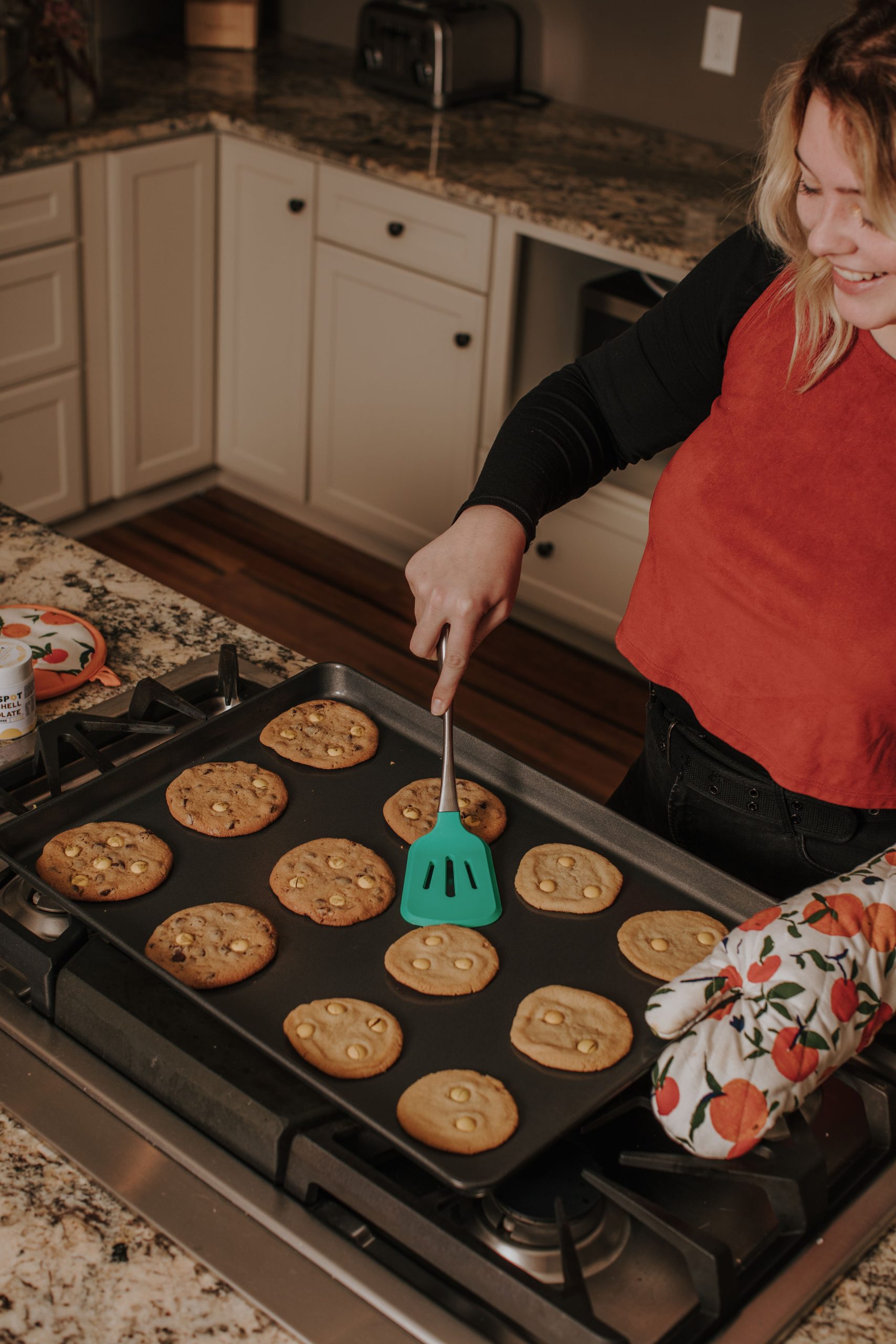 woman cooking edibles in her kitchen